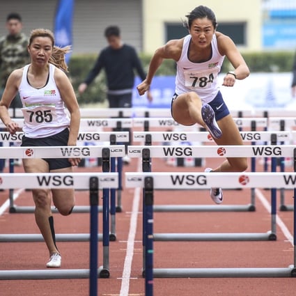 Vera Lui wins the first race of the season to qualify for next month’s Asian Indoor Championships in the women’s 60m hurdles. Leung Ching-yi (yellow) finishes second, while Shing Cho-yan comes third at Wan Chai Sports Ground. Photo: Dickson Lee