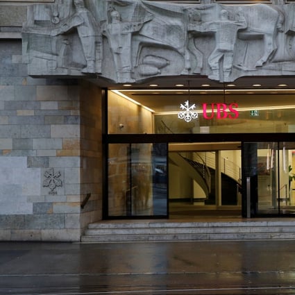 Swiss banking group UBS is trimming the bonus pool for Asia investment bankers for 2019 as deal slumps. Photo: Reuters
