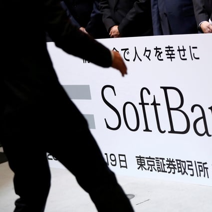 A SoftBank Corp placard is prepared during a ceremony to mark the company's debut on the Tokyo Stock Exchange in Tokyo, Japan December 19, 2018. Photo: Reuters