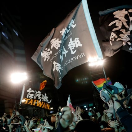 Hong Kong anti-government protesters attend a rally for Taiwan President Tsai Ing-wen after her election victory in Taipei. Photo: Reuters
