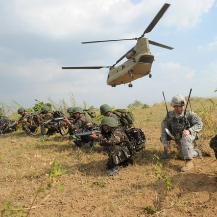Philippine soldiers train with their US counterparts during an air assault exercise inside the military training camp of Fort Magsaysay in Nueva Ecija province north of Manila. Photo: AFP