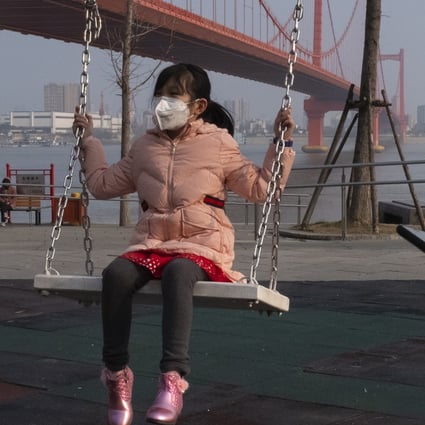 A child plays on a swing in Wuhan, the epicentre of the coronavirus epidemic. Photo: AP