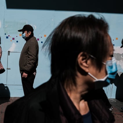 People queue outside a store to purchase surgical masks amid the coronavirus outbreak. Photo: Keith Tsuji/SOPA Images via ZUMA Wire/dpa