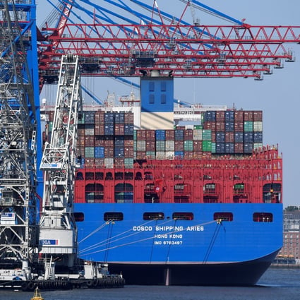 A Chinese Cosco container ship unloads at the port of Hamburg in Germany in July 2018. Photo: Reuters