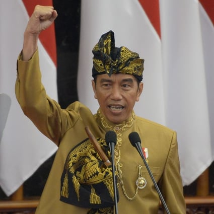 Indonesia’s President Joko Widodo delivers his state-of-the-nation address last August. He set the 75 per cent target for financial inclusion in 2016. Photo: AFP
