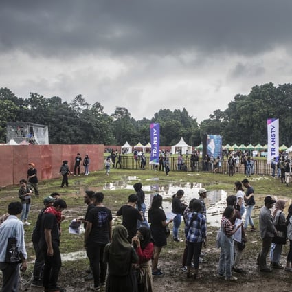 In Indonesia, rain masters are often hired by organisers of outdoor events for their perceived ability to prevent rainfall from ruining the day. Photo: Agoes Rudianto