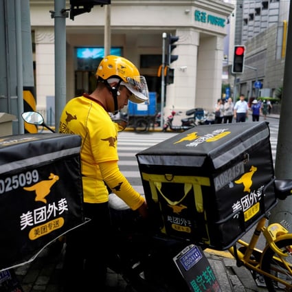Drivers of food delivery service Meituan are seen in Shanghai, China in 2018. File photo: Reuters