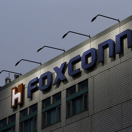 The logo of Foxconn Technology Group, the trading name of Hon Hai Precision Industry, is seen on top of the company's headquarters in New Taipei City, Taiwan. Photo: Reuters