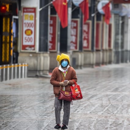 Entry restrictions have gone into effect in Guangzhou to try to contain a coronavirus outbreak. Photo: EPA