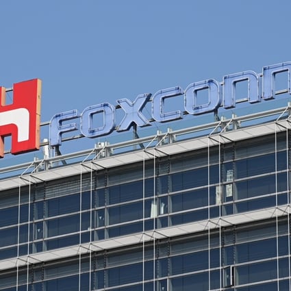 The logo of electronics contract manufacturer Foxconn Technology Group, formally known as Hon Hai Precision Industry, is displayed at its headquarters in Taipei. Photo: Agence France-Presse