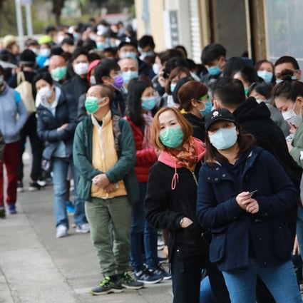 People in an overnight queue to buy masks at Kowloon Bay. Photo: May Tse