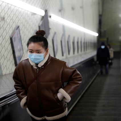Beijingers have been ordered to wear face masks in public. Photo: Reuters