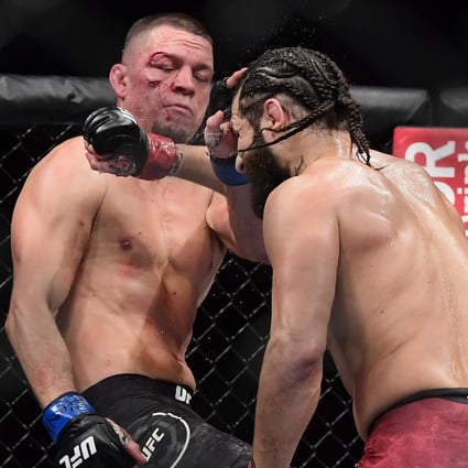 Jorge Masvidal throws a punch at Nate Diaz during UFC 244. Photo: AFP