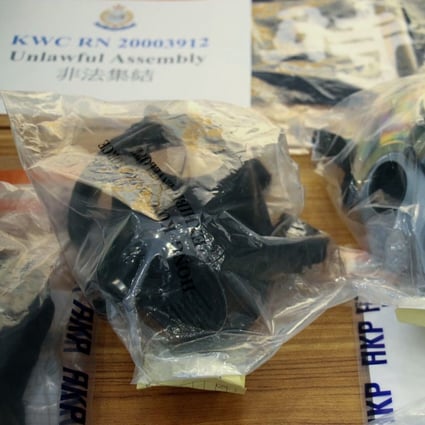 Police displayed items including gas masks seized from 12 suspects arrested for an illegal gathering at Kwai Luen Estate in Kwai Chung in Hong Kong. Photo: Handout