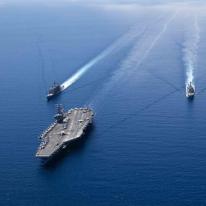 The aircraft carrier USS Ronald Reagan and ships from its strike group in the South China Sea. Photo: AFP