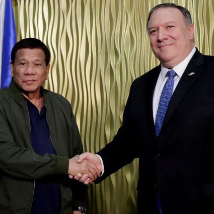 Philippine President Rodrigo Duterte and US Secretary of State Mike Pompeo pose for a photo at Villamor Air Base in Pasay City, Metro Manila, on February 28, 2019. Photo: Reuters