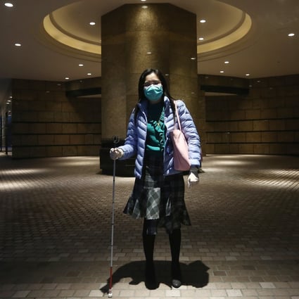 Jess Shek disinfects her cane after every use, but a shortage of hygiene products makes her feel vulnerable. Photo: Jonathan Wong