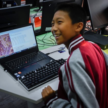 A boy participates in a computer coding course in Beijing in November 2019. Now Chinese students stuck at home due to the coronavirus can learn about AI online. Photo: AFP