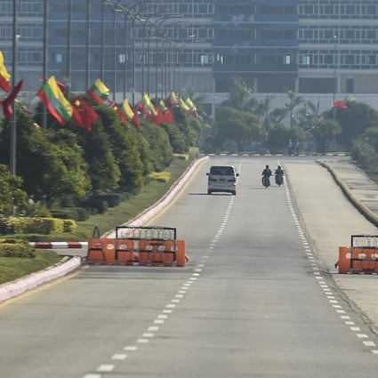 Chinese and Myanmar flags decorate lamp posts along a road in Naypyidaw ahead of the recent visit of Chinese President Xi Jinping to the Myanmar capital. The city may finally start coming to life soon, 15 years after it was built. Photo: AFP