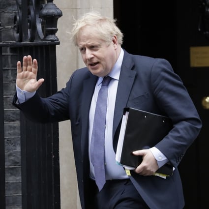 British Prime Minister Boris Johnson leaves 10 Downing Street in London on February 12. Photo: AP