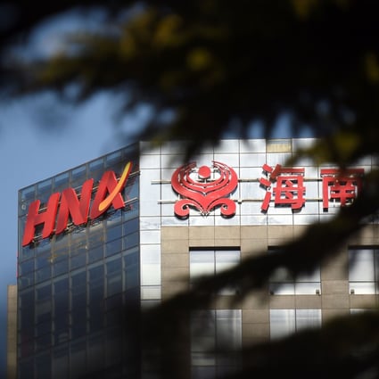 HNA Group’s logo on its corporate head office building in Beijing on February 2016. Photo: Agence-France Presse