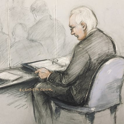 A court artist’s sketch of Wikileaks founder Julian Assange in the dock reading his papers for his extradition hearing on Monday. Photo: AP