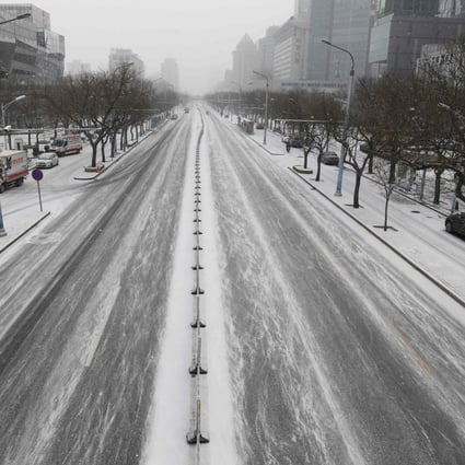 An empty street in Beijing on February 5, 2020 on what should otherwise be a busy week day in one of the Chinese capital’s prime shopping and entertainment areas. Photo: AFP