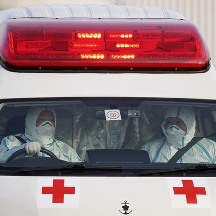 An ambulance in Japan transports a Diamond Princess cruise passenger infected with the coronavirus. Photo: EPA