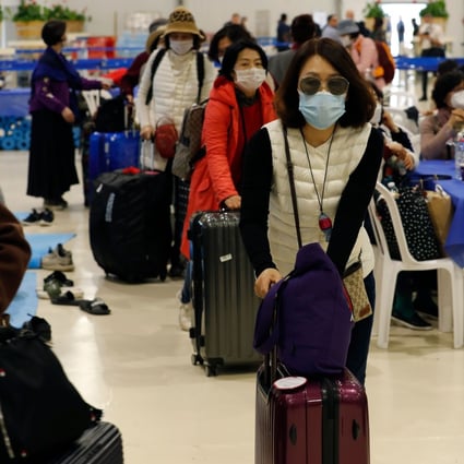 South Korean tourists pictured at an airport leaving Israel on Monday. Photo: AFP