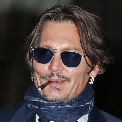 Actor Johnny Depp leaves the High Court in London on Wednesday after attending a hearing in his libel case against the publishers of The Sun and its executive editor, Dan Wootton. Photo: dpa