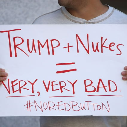 A protester during an anti-nuclear weapon rally outside the Trump International Hotel in Washington, DC. File photo: AFP