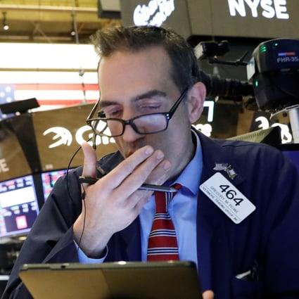 Traders work on the floor at the New York Stock Exchange on Thursday. Photo: Reuters