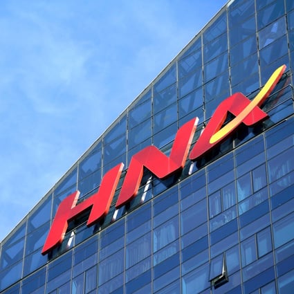 HNA Group logo is seen on the building of HNA Plaza in Beijing on February 9, 2018. Photo: Reuters