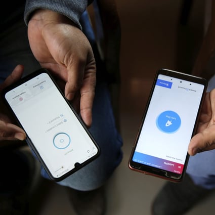 Young Kashmiris connect their mobile phones to a virtual private network (VPN) to access social media. The Indian government banned the internet in Kashmir in August but restored 2G internet services in late January, with selective restriction on access. Photo: EPA-EFE
