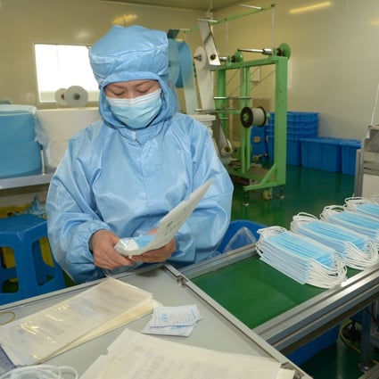 As of Saturday, China’s daily output of masks, including surgical masks and medical N95 masks, was 116 million units, or 12 times the output at the start of February, the country’s top economic planning agency said on Monday. Photo: Xinhua