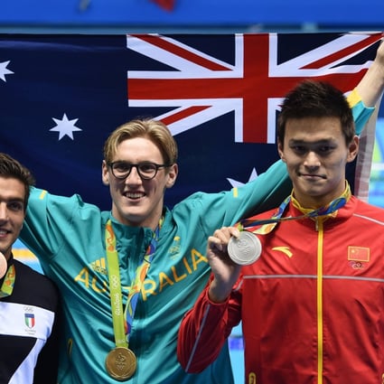 Gold medal winner Mack Horton with Sun Yang and Gabriele Detti of Italy after the men's 400m freestyle final at the 2016 Rio Olympics. Photo: EPA