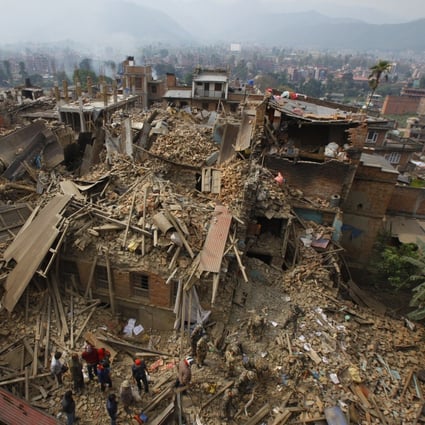 Rescuers sift through debris as they search for victims of earthquake in Bhaktapur near Kathmandu, Nepal on April 26, 2015. Photo: AP