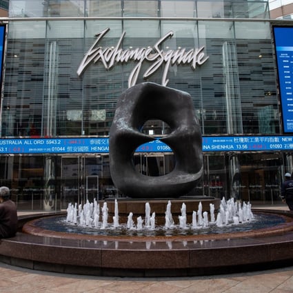 Electronic billboards display the Hang Seng Index at Exchange Square in Hong Kong on 9 March 2020. Photo: EPA-EFE