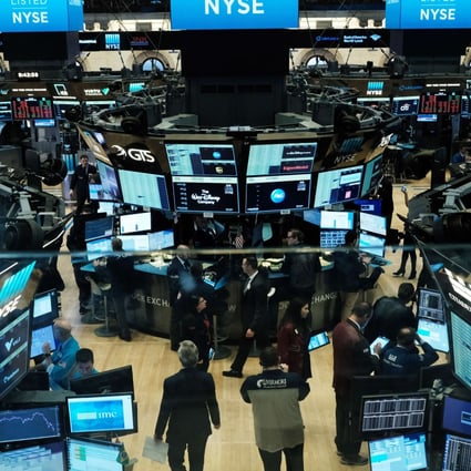 Traders work on the floor of the New York Stock Exchange. Photo: AFP
