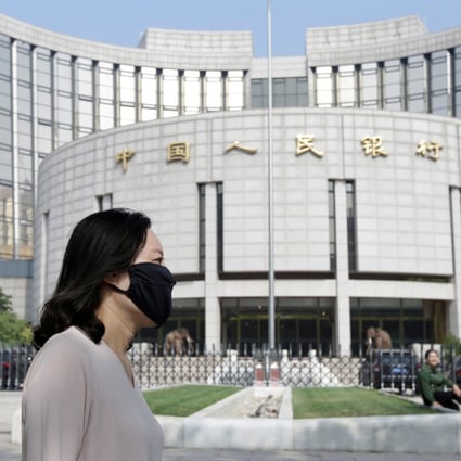 China’s new loans stood at 906 billion yuan (US$130 billion) in February, down sharply from a record 3.34 trillion yuan (US$480 billion) in January. Photo: Reuters