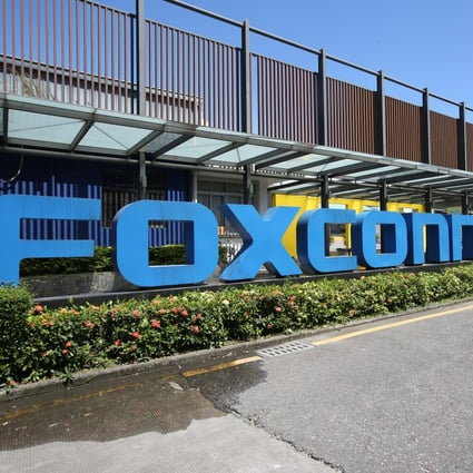 The logo of Foxconn Technology Group, the main assembler of Apple’s iPhones, is seen at the facade of its manufacturing complex in the Longhua district of Shenzhen, in southern Guangdong province. Photo: Nora Tam