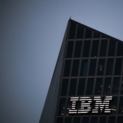 A logo sits illuminated on the IBM Watson cognitive computing platform Internet of Things (IoT) center, at the IoT center in Munich, Germany. Photo: Bloomberg
