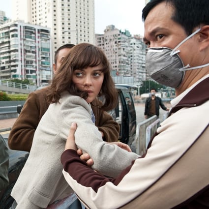 Marion Cotillard (centre) in a scene from Contagion (2011). Makers of the film have explained how they saw an outbreak like coronavirus coming. Photo: Claudette Barius