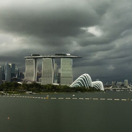 Dark clouds above Singapore’s skyline. Photo: Xinhua