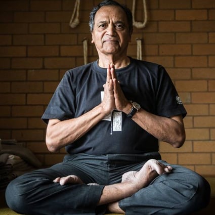 Catholic priest Father Joseph Pereira practises yoga at the Kripa centre in Camphal, Goa, India. He is the founder of the Kripa Foundation, which uses yoga and Western anti-addiction techniques to treat addicts in India.