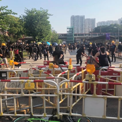 Protesters set up a roadblock in Hong Kong’s Tuen Mun area during a September 21 protest. First aid volunteer Ng Hei-lun was arrested at the protest and charged with possession of an unlicenced walkie-talkie. Photo: Sam Tsang