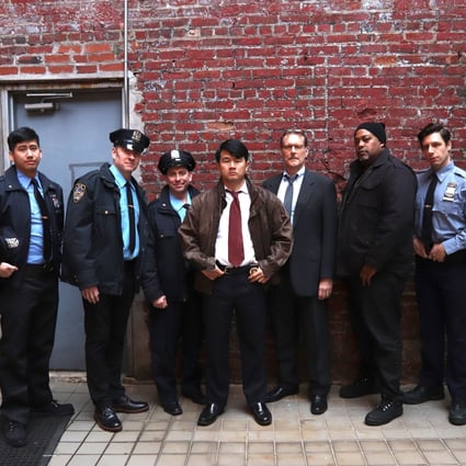 Ronny Chieng (centre) in a still from A Father's Son (2020). Photo: Lia Chang