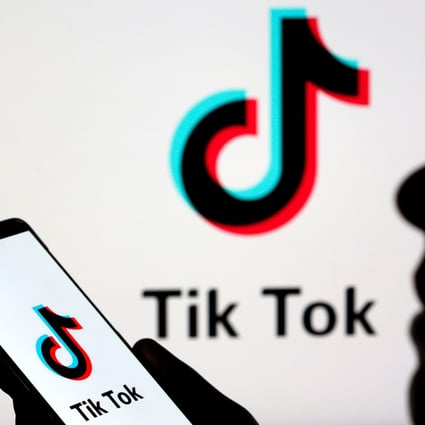 A person holds a smartphone with Tik Tok logo displayed in this picture illustration taken November 7, 2019. Photo: Reuters