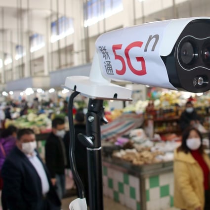 A new thermal temperature detector using 5G is pictured scanning customers at a market in Wuzhong district, Suzhou city, China’s Jiangsu province, on Thursday Feb. 20, 2020. HANDOUT