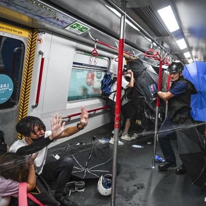 Police chase protesters onto a train at Prince Edward as clashes between officers and demonstrators erupt on August 31, 2019. Photo : Handout